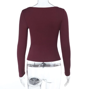 Rear view of slim-fit wine red long-sleeved top with ribbed knit texture detail