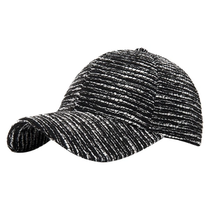 Classic black and white tweed baseball cap with curved brim for winter fashion