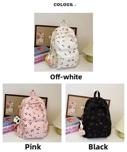 Three variants of cherry pattern corduroy backpacks in off-white, pink, and black colors