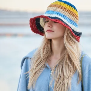 Colorful striped handmade woven straw sun hat for women featuring vibrant rainbow patterns