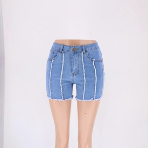 Slim fit high waisted light blue denim shorts with white distressed striped拼接 and frayed hems