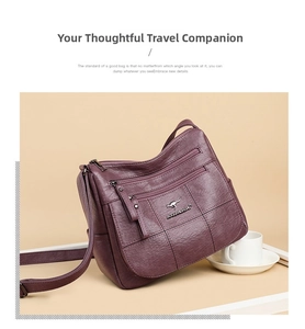 Detail of dark purple faux leather crossbody bag with multiple zippers and kangaroo logo