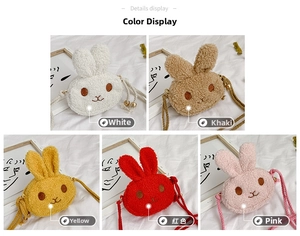 Close-up of cute plush rabbit bags in white, khaki, yellow, red and pink colors