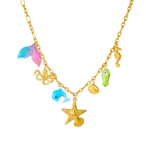 Golden ocean theme necklace with colorful mermaid tail, seahorse and dolphin charms