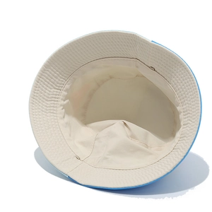 Detail shot of a double-sided kids sun hat showing premium canvas fabric and stitching