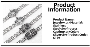 Detail of silver stainless steel hip-hop bracelet featuring multi-link chain and star charms