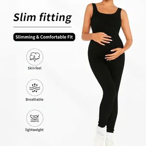 Slim fitting maternity jumpsuit in black elastic knit featuring u-neck and belly support