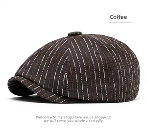 Detailed view of dark brown striped newsboy cap showing textured fabric and top button