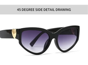 Detail of butterfly sunglasses with golden heart accent and purple gradient lenses
