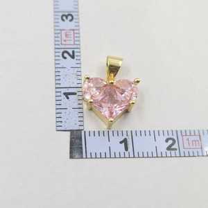 Detailed measurement view of pink heart pendant with gold base showing exact dimensions
