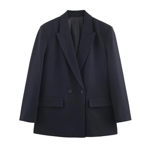 Detail view of navy blue double-breasted blazer with pinstripe texture and notch lapel