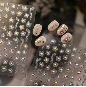 Macro shot of TL-359 floral nail decals featuring macaron colors and silver metallic lines