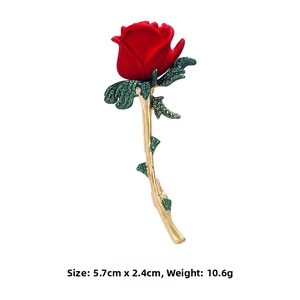 Detail view of red rose brooch size 5.7x2.4cm and weight 10.6g with matte finish