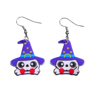 Detail of cartoon skeleton earrings with purple wizard hats and stars for Halloween party