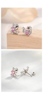 Detailed view of pink heart zircon moon and star earrings with screw back closure