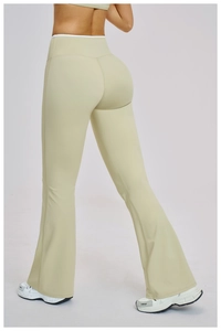 Detailed back view of high-waisted sage green flared yoga pants with slim-fit lifting effect