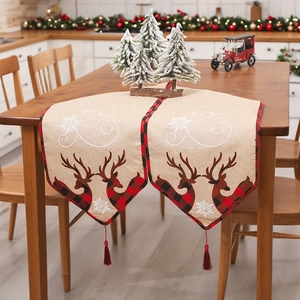 Christmas burlap table runner with reindeer embroidery, red tassels and plaid patterns