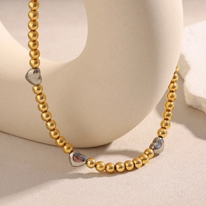 Collana minimalista in acciaio inossidabile placcato oro 18K con cuori in argento