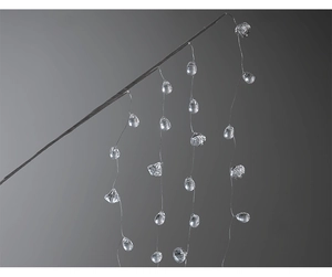 Macro detail of acrylic Christmas icicle pendants with faceted water drop crystals