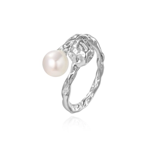 Silver-plated adjustable ring featuring a textured hammered band and a single faux pearl