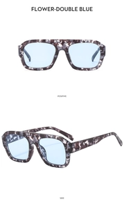 Detailed front and side view of oversized aviator sunglasses with floral marble frames