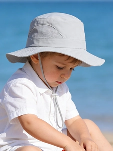 Detail of light gray kids sun hat with breathable mesh and adjustable chin strap