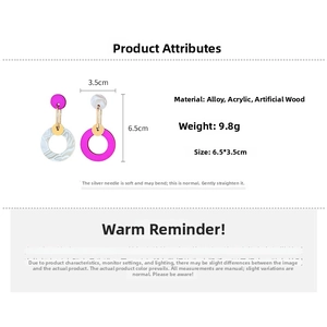 Detail view of asymmetric geometric earrings with dimensions and material specifications