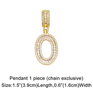 Macro shot of gold pendant letter O with round and baguette zircon inlay details