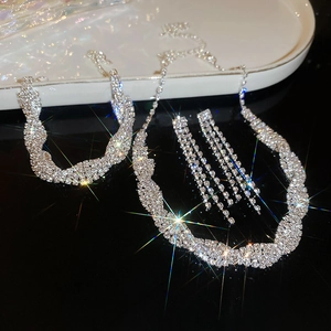 Sparkling silver twisted jewelry set with crystal necklace, bracelet and earrings