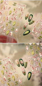 Detail showing red bamboo nail stickers with golden embossed 3D ink art lines