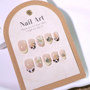 French style press-on nails with 3D floral art, leopard print and pearl charms