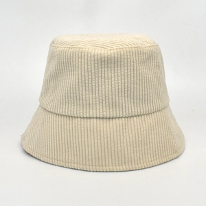 Close-up of beige corduroy bucket hat showing detailed vertical striped fabric texture