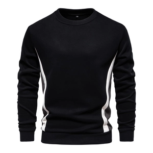 Detail of slim-fit sweatshirt showing black fabric with white and grey side panel stitching