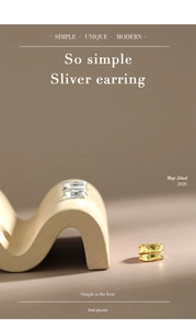 Close-up of irregular textured wave ear cuffs in silver and golden finishes