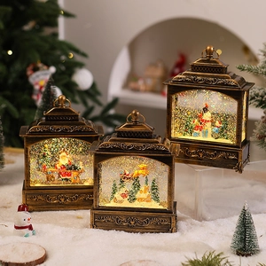 Vintage bronze Christmas lantern showing a detailed Santa scene with swirling glitter