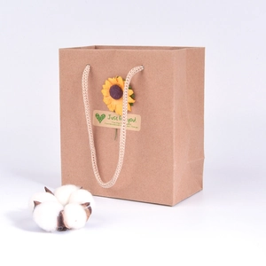 Vintage brown kraft paper gift bag with decorative sunflower and Just for you sticker