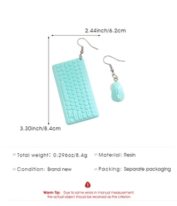Detail view of 3D resin keyboard and mouse earrings with weight and size specifications