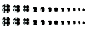 Detailed set of black and white checkered and solid black press-on toenails on white backdrop