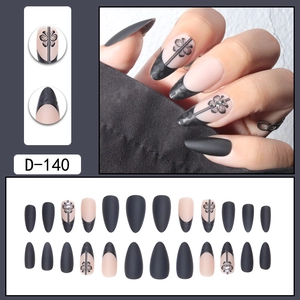 Elegant French black almond press-on nails with floral patterns and delicate rhinestones