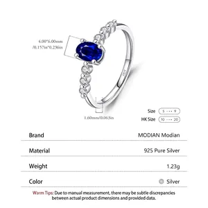 S925 sterling silver ring featuring a 4x6mm oval blue sapphire and side stones