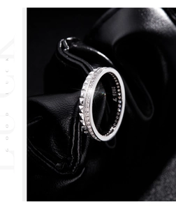 Macro shot of S925 silver ring band showing the hallmark and detailed diamond setting