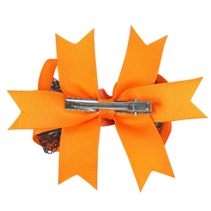 Detailansicht der Kinder-Haarklammer zu Halloween mit orangefarbenem Band und Spitze