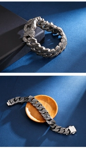 Detail of vintage carved 316L stainless steel bracelet with intricate textures