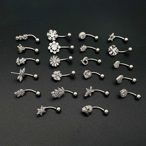 Detailed grid view of 18 silver stainless steel belly rings with heart and butterfly motifs