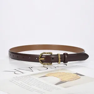 Women's vintage dark brown leather belt with textured antique gold metal buckle