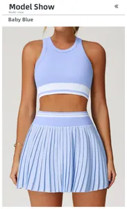 Detail of baby blue seamless yoga vest and pleated skirt set with striped elastic bands