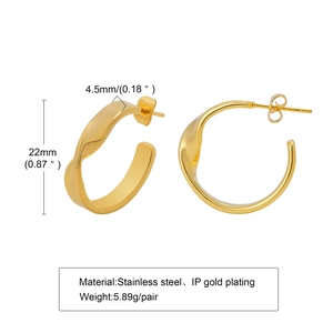 Macro detail of twisted gold-plated stainless steel earrings with 22mm size specs