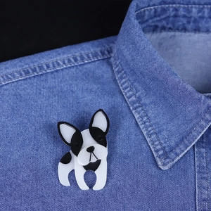 Handmade acrylic Boston Terrier dog brooch pinned on a blue denim shirt collar