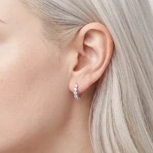Classic S925 sterling silver hoop earrings with five sparkling moissanite stones