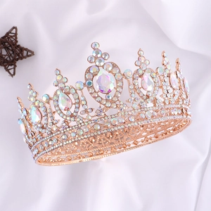 Macro shot of rose gold bridal crown featuring AB colorful rhinestones and water drop gems
